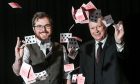 Eoin and Ivor Smith with some flying playing cards at the Lemon Tree in Aberdeen.