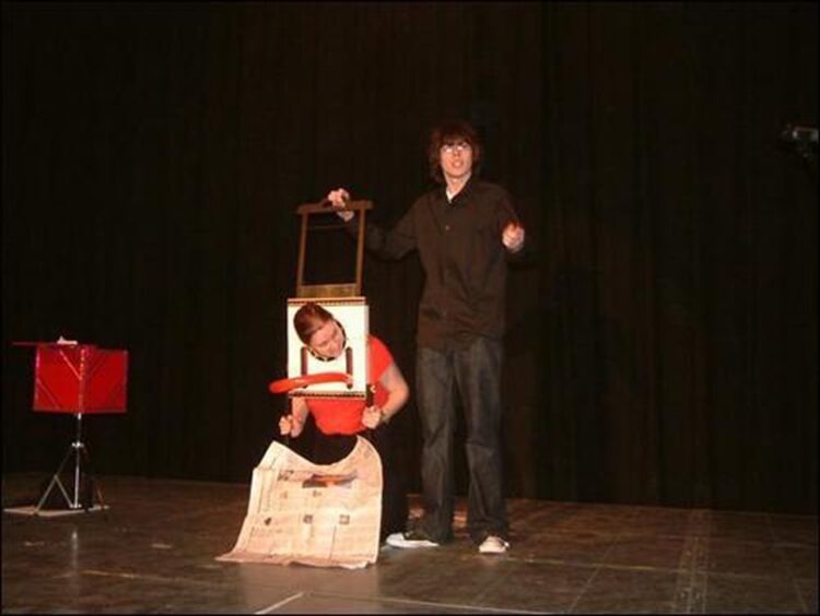 Magician Eoin Smith's first performance on stage with his history teacher in a guillotine.