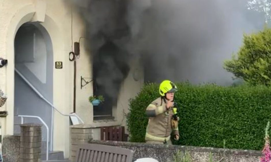 A man has died after a fire in a block of flats in Aberdeen.