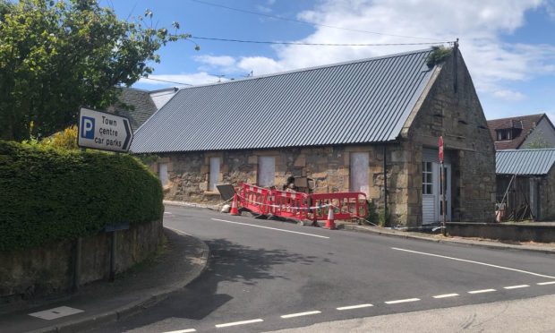 The site of the Tain car crash into a building on Hill Street