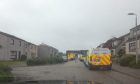 Police and ambulance crews pictured outside a house in Fraserburgh.