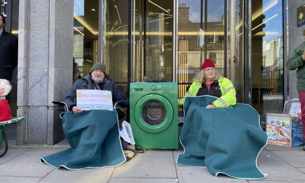 Extinction Rebellion Scotland activists outside Shell's Union Street Aberdeen office.  Image: XR Scotland