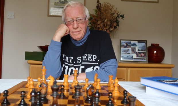 Gerald Lobley with chess board.