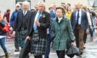 Princess Anne visits the Portsoy Boat Festival, second from left is chairman David Urquhart.. Portsoy. Supplied by Portsoy Boat Festival Date; Unknown