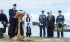 Findhorn solemnly hosted a Commemoration and Remembrance Service, paying tribute to the bravery and sacrifice of those who courageously stormed the beaches on D-Day. All pictures by Jason Hedges/DC Thomson