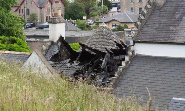 Close-up of destroyed roof at Ladyhill House.