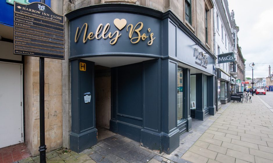 Exterior of Nelly Bo's looking down Elgin High Street.