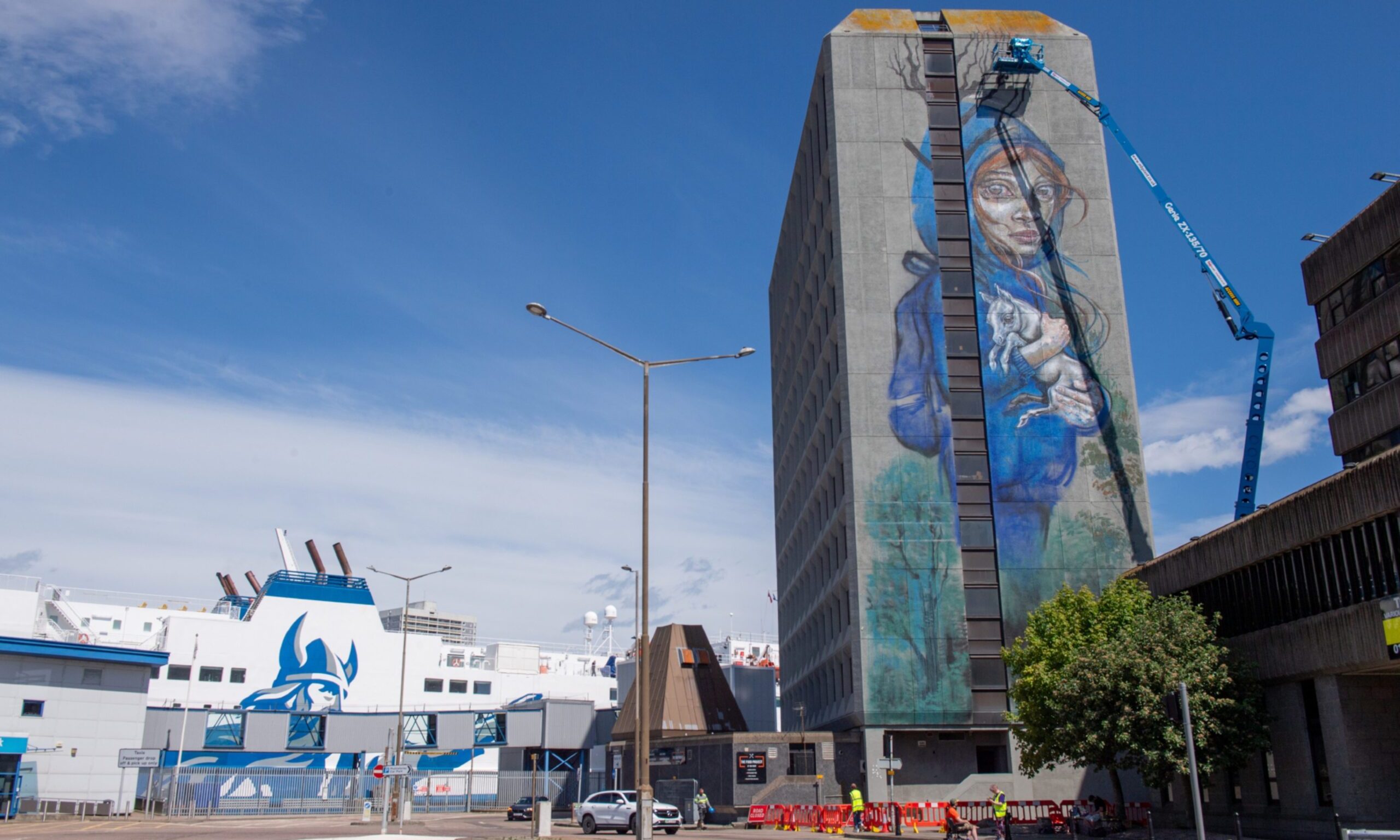 The mural being painted on the side of the building which could soon be home to an Aberdeen Harbour tattoo studio