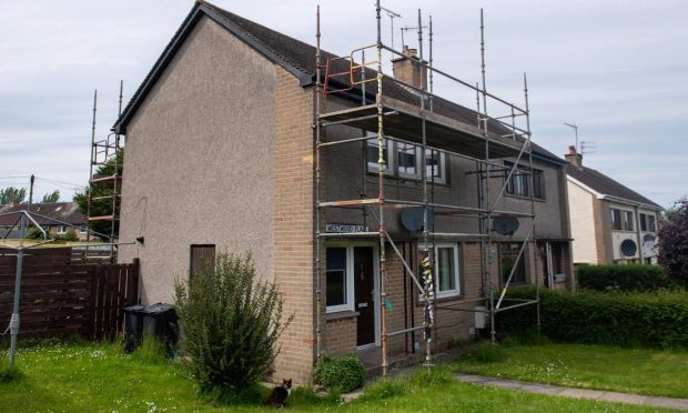 The scaffolding outside Michael Leslie's Bucksburn council home. Image: Kath Flannery/DC Thomson