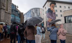 Locals and tourists alike braved the rain to hand down their verdict on the new murals. Image: Kath Flannery/DC Thomson