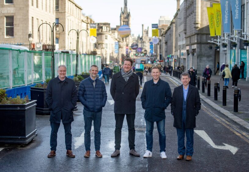 Derren McRae (second from right) was part of the campaign to pedestrianise the central part of Aberdeen's Union Street - but the bus gates are worse than the prospect of cars returning, he says. Image: Kath Flannery/DC Thomson