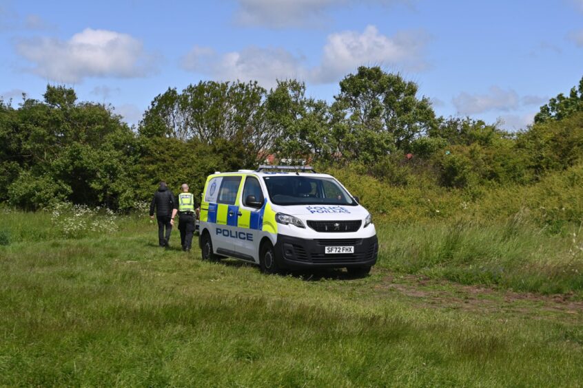 Police at Aberdeen beach after a woman's death