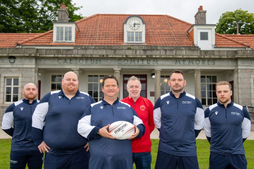 Aberdeen Grammar Rugby Club's new head coach Justin Taljaard (holding the ball) with his coaching team L-R Jack Burnett, John Stewart, Don Vasey, Marc Muir and Jonny Spence. Image: Kami Thomson/DC Thomson.