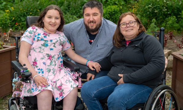 The Townhill family, from left, Lucy, Stuart and Allyson. They have learned to adapt to living with SMA. Image: Kami Thomson/DC Thomson