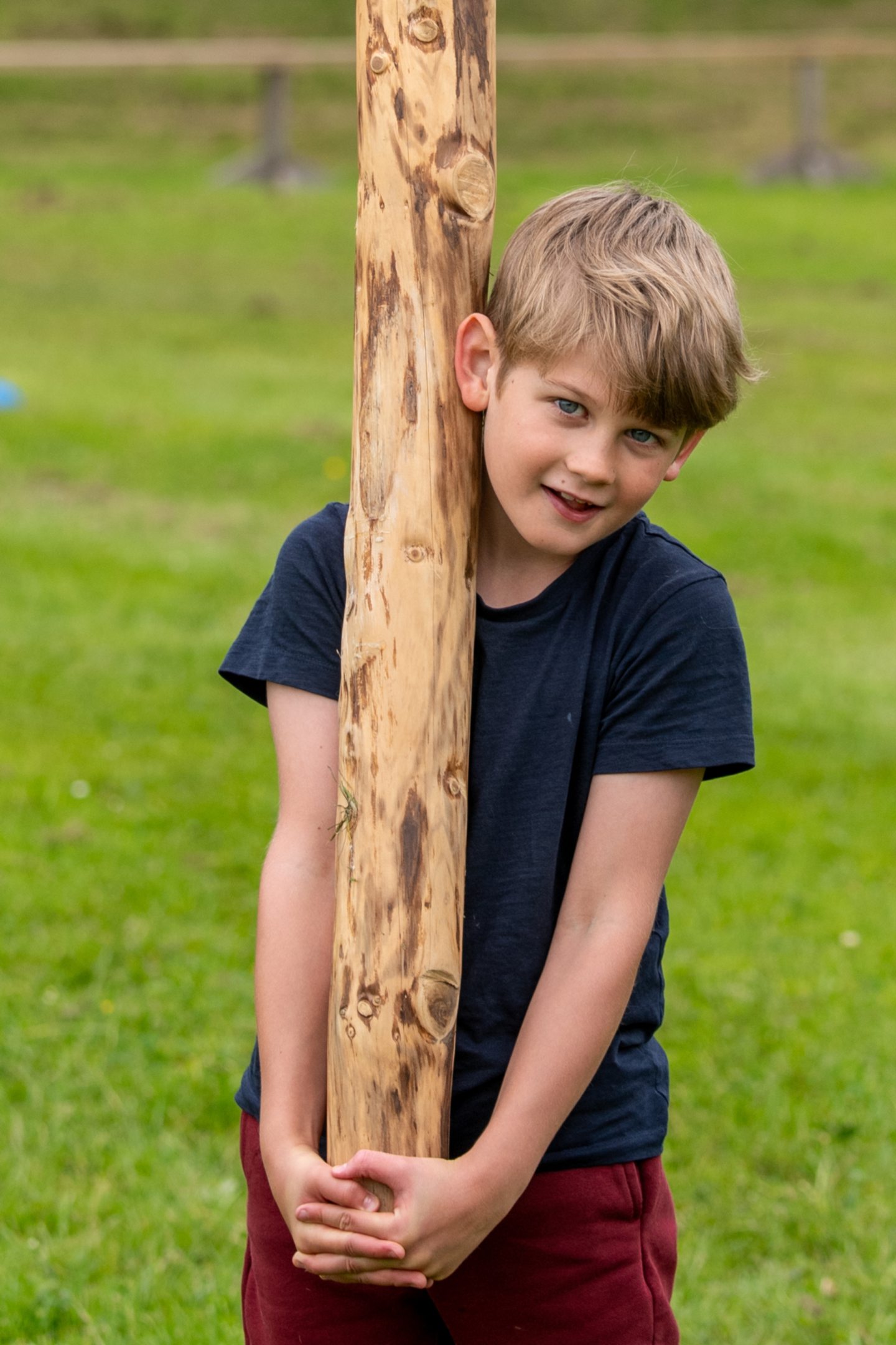 Emil Haluszczak with his junior caber.