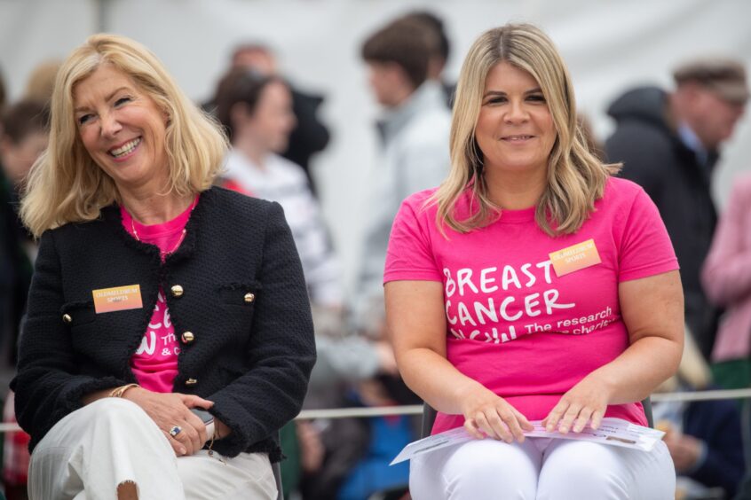 Women wearing pink Breast Cancer Now t-shirts