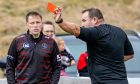 Oban Camanachd manager Gareth Evans receives a red card from referee Robert Baxter against Lochaber. Image: Neil G Paterson.