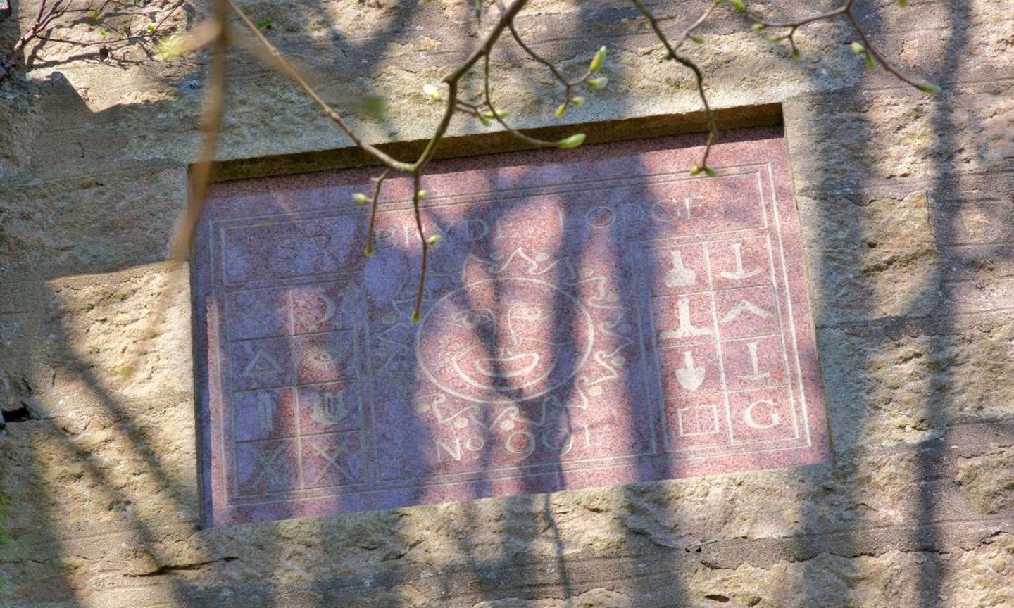 Carving on the wall outside the Masonic lodge in Kemnay.