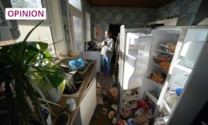 Kim Clark inside her flood-damaged home in River Street after a visit by then First Minister Humza Yousaf to Brechin in October 2023. Image: Andrew Milligan/PA Wire