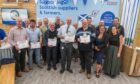 The 12 finalists in the Kepak McIntosh Donald/Tesco steak competition, with joint winners John Troup and Brian Grubb, front centre.