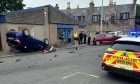 A car was flipped onto its roof as a result of the crash on West Road in Peterhead.