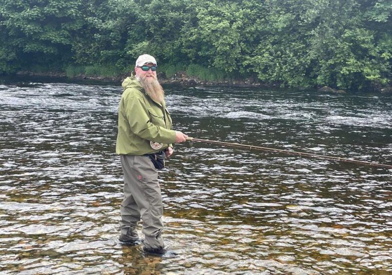 Neil O'Neil in the River Lochy.