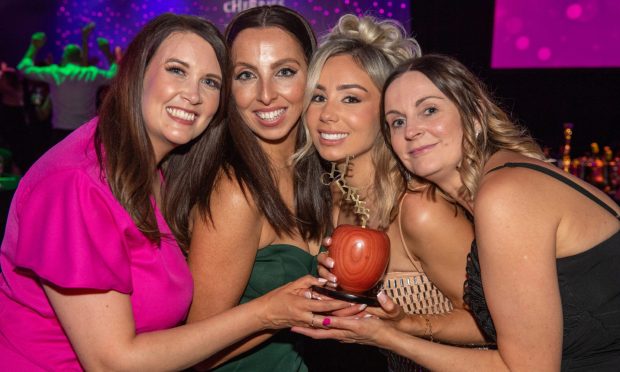 cHeRries winner Kristi Strachan, from Stork, and colleagues. Image: Kenny Elrick/DC Thomson