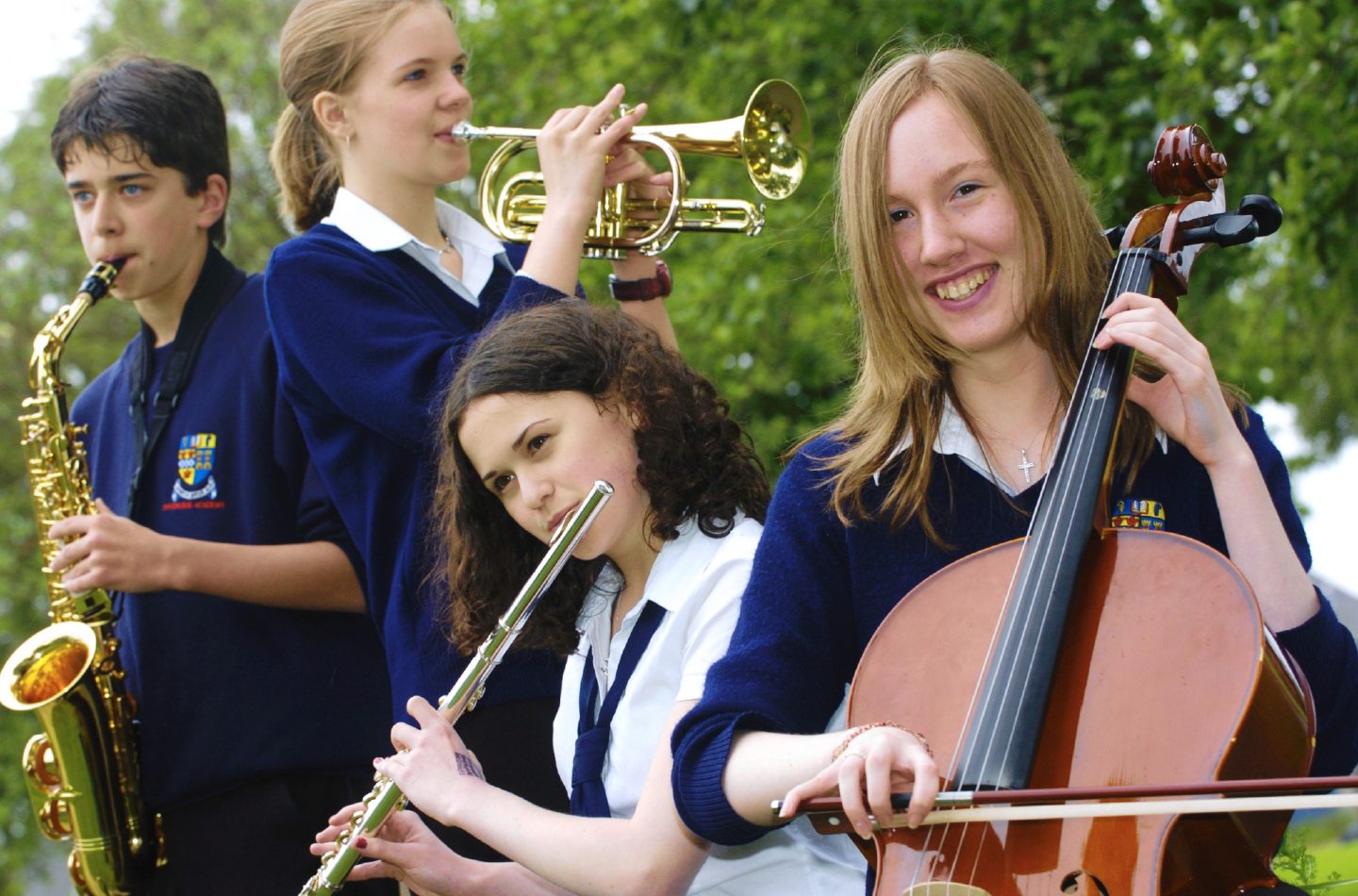 Inverurie Academy posing for photos with musical instruments