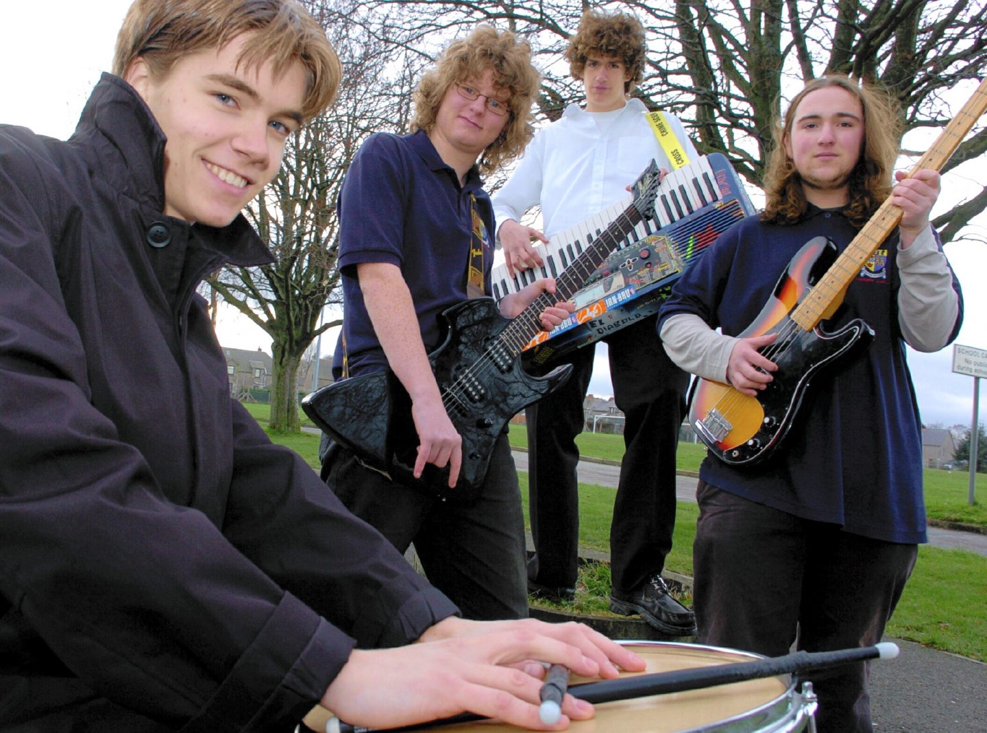 Inverurie Academy pupils posing with various instruments