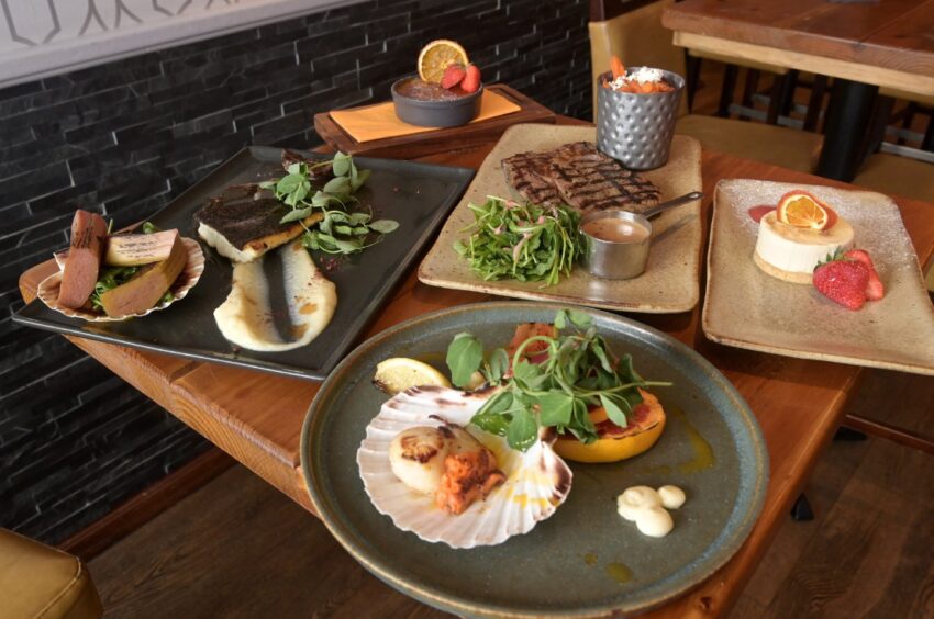 A table full of meals at Prime restaurant