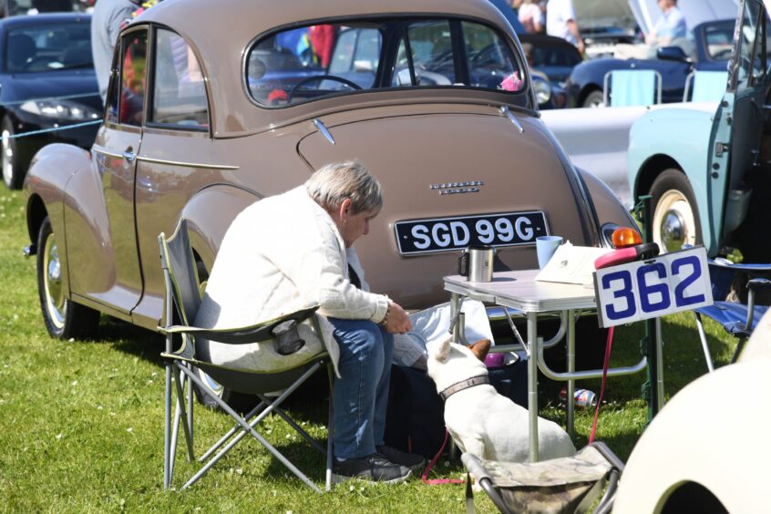 Woman and her dog at Fraserburgh Vintage Car Rally