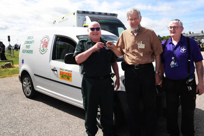 JAMES GRAY (CENTRE) OF THE RIMSPOKE TRANSPORT COLLECTION HANDS OVER THE KEYS OF A NEW VAN TO BROCH COMMUNITY FIRST RESPONDER DOUGLAS EWEN WATCHED BY FELLOW RESPONDER WILLIAM BOWIE.SINCE THE SERVICE WAS STARTED EIGHT YEARS AGO,THE TEAM OF ELEVEN VOLUNTEERS HAVE ATTENDED OVER 2500 CALLS, 240 THIS YEAR ALREADY AND COVERED THOUSANDS OF MILES THROUGHOUT THE BUCHAN AREA HELPING TO SAVE LIVES.