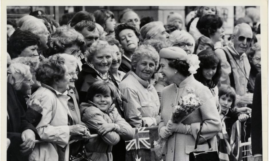 Queen Elizabeth II 1985-08-15_03 (C)AJL

Used P&J 16.08.1985 - "Smiles all round as the Queen stops to chat to a section of the large crowd outside Inverness Town House."

USED IN P&J 2024