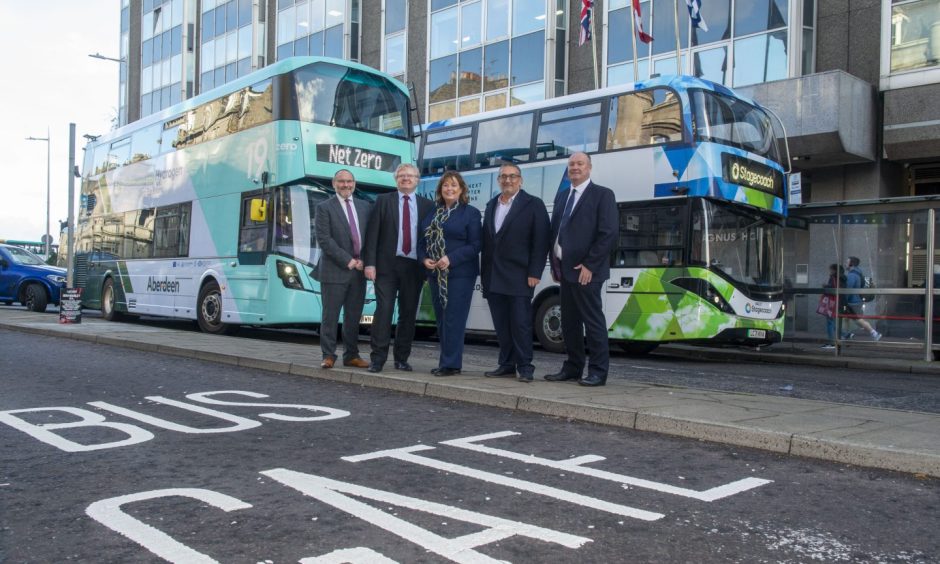 Transport Secretary Fiona Hyslop was in Aberdeen with council co-leaders Ian Yuill (centre, left) and Christian Allard (centre, right) and bus bosses to see how the city centre bus gates were working. Image: First
