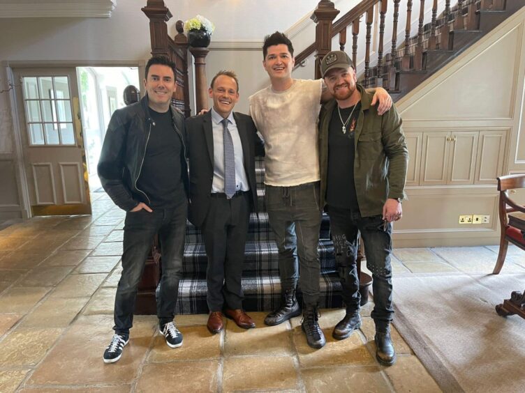 Marcliffe managing director Ross Spence, second from the left, with members of Irish rock band The Script. 