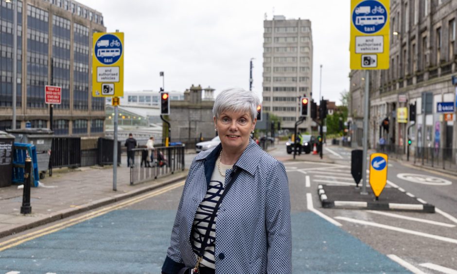 Mary Martin from Aberdeen Douglas Hotel at the bus gate on Bridge Street, Aberdeen.