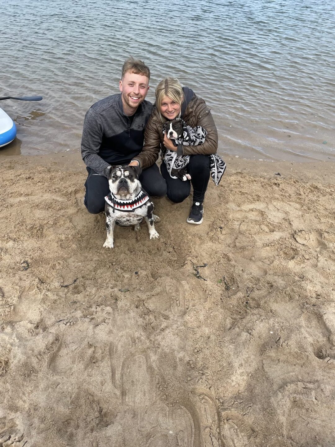 Samantha Wiseman and her partner Cameron, pictured with their adorable dogs Gloria and Gladdis.