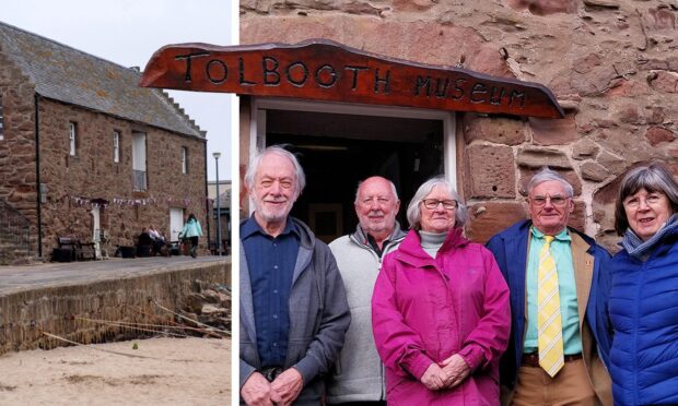 Members of the Stonehaven Tolbooth Association and the historic harbour building. Image: Clarke Cooper/DC Thomson