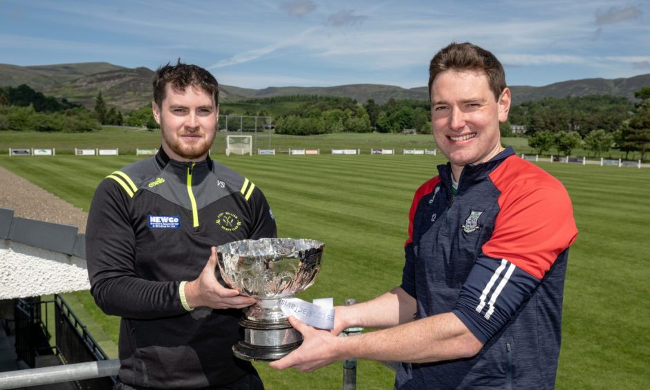 Fort William captain Victor Smith and Kingussie captain Calum Grant ahead of the Mactavish Cup final. Image: Neil G Paterson.