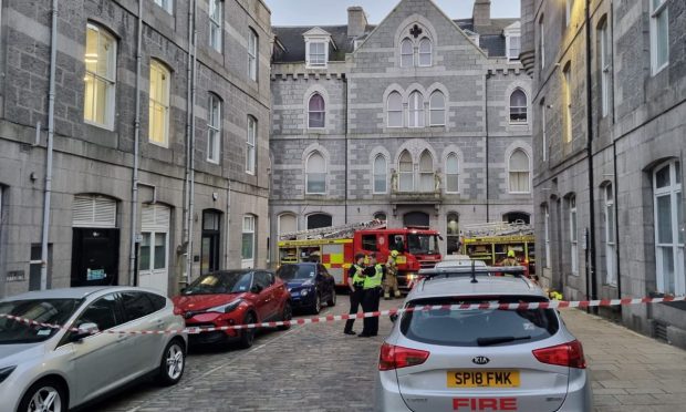 Four fire crews remain at Stirling Street in Aberdeen city centre. Image: Graham Fleming