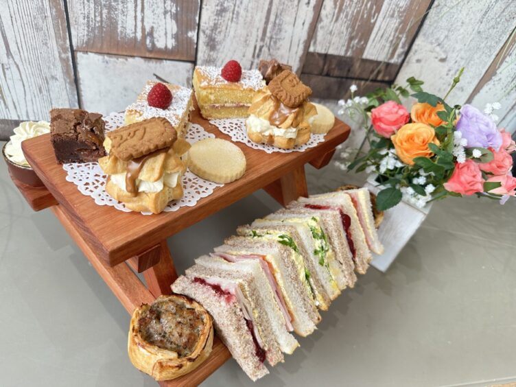 Simpsons afternoon tea served on a picnic bench