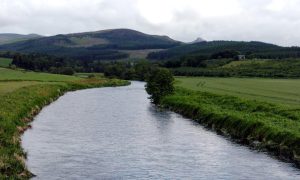 River Don with fields and hills surrounding.