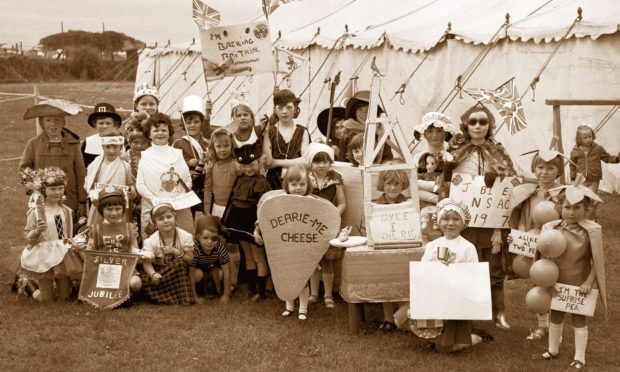 1977: A crowd of around 400 turned up for the opening of Dyce Gala Week in 1977. Pictured is a happy group of children who took part in the fancy dress parade. Image: DC Thomson