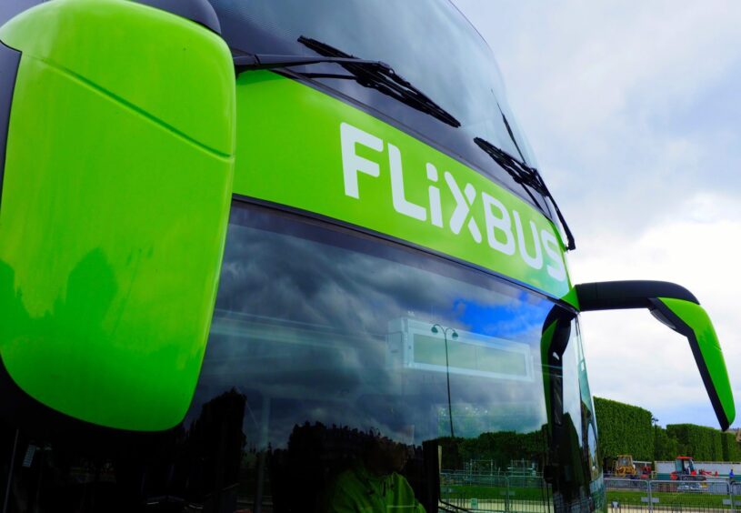 FlixBus logo on front of green bus