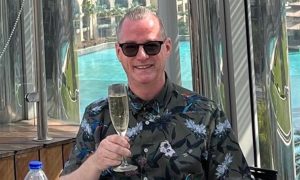 Council embezzler Michael Paterson sips champagne during a holiday in Dubai in 2022. Image: Facebook