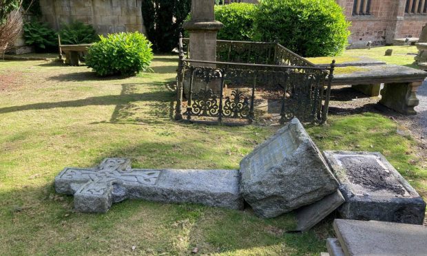 The St Duthus graveyard memorials have split as they toppled over by vandals