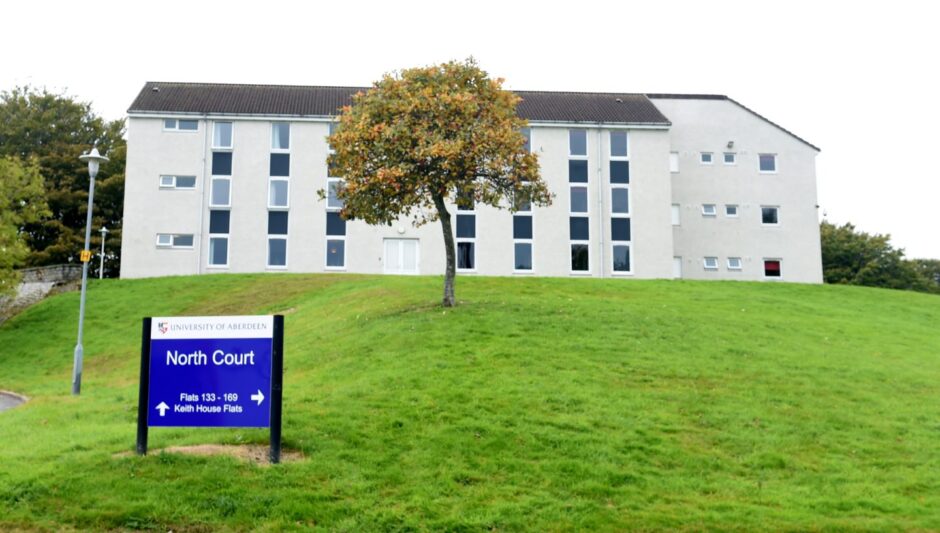 Hillhead building behind a University of Aberdeen sign