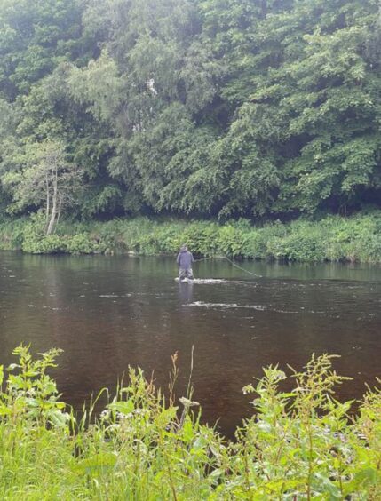 The Outlander actor fly fishing in Aberdeenshire.