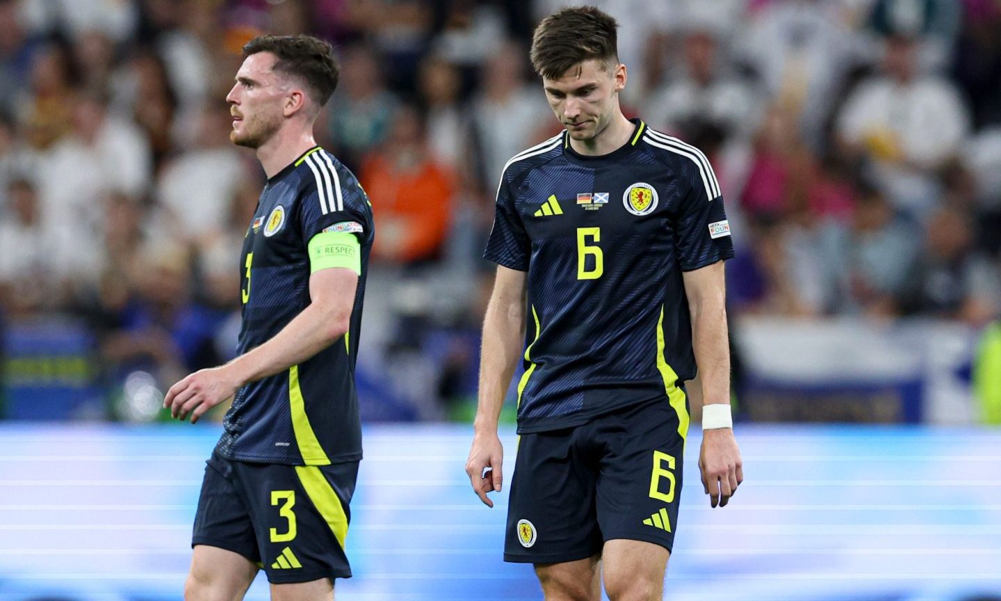 Andrew Robertson and Kieran Tierney look dejected after the Scotland game.