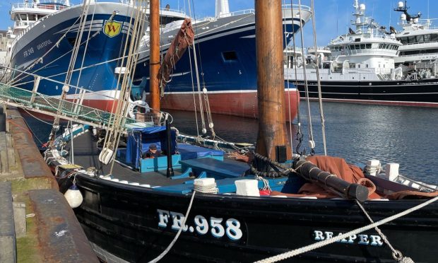 Reaper in Fraserburgh, with two modern-day pelagic vessels behind her.